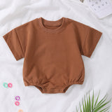 Barboteuse à manches courtes en coton biologique – Douceur et confort pour bébé