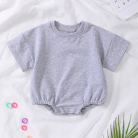 Barboteuse à manches courtes en coton biologique – Douceur et confort pour bébé