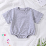 Barboteuse à manches courtes en coton biologique – Douceur et confort pour bébé