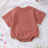 Barboteuse à manches courtes en coton biologique – Douceur et confort pour bébé