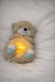 Peluche apaisante respirante bébé – Lumière douce & sons calmants